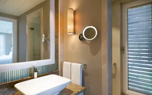 CARESSE HOTEL - TWO BEDROOM SUITE DRESSING ROOM CARESSE HOTEL - TWO BEDROOM SUITE DRESSING ROOM